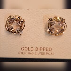 Yellow gold color earrings. Cool wire design.